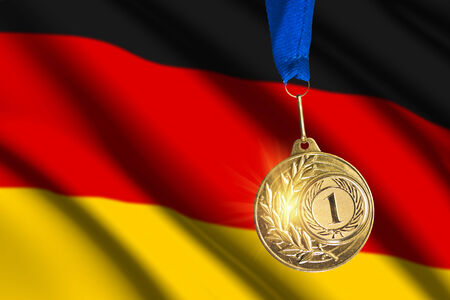 golden medal against German flag backgroundの写真素材