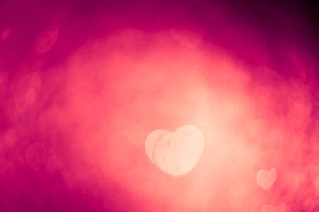 abstract bokeh purple heart shapeの写真素材