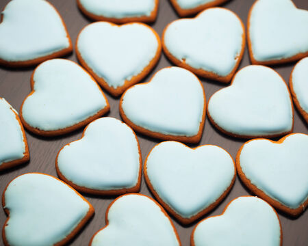 multitude of cookies hearts on brown backgroundの写真素材