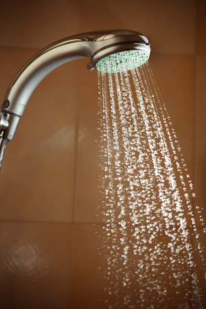 shower with flowing waterの写真素材