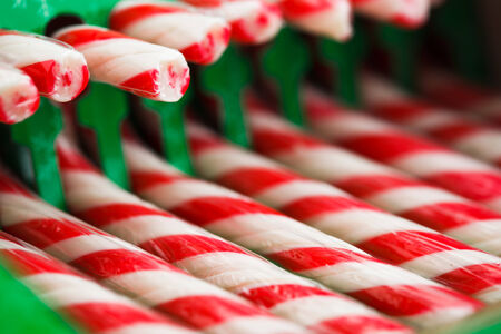 candy canes in green pack, closeup viewの写真素材