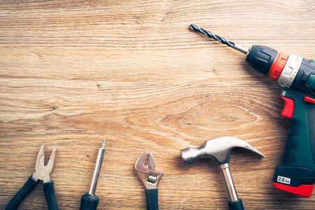 work tools on wooden background