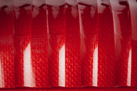 red shell carbon fiber background, closeup viewの写真素材