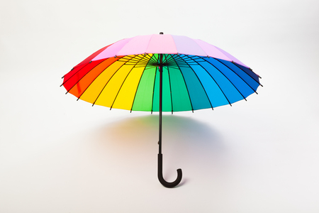 multicolored umbrella on white backgroundの写真素材