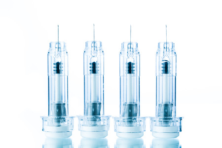 disposable syringes isolated on white
