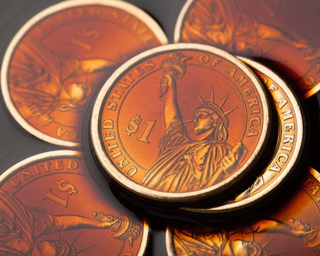 dollar coins in the crude oil - barrel price concept