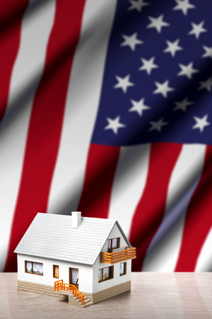 house against USA flag backgroundの写真素材