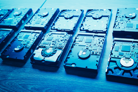 hard disk drives in a rows, blue toneの写真素材