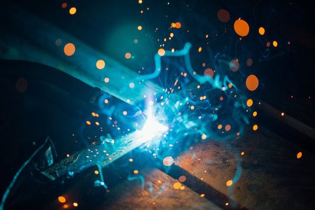 artistic welding sparks light, industrial backgroundの写真素材