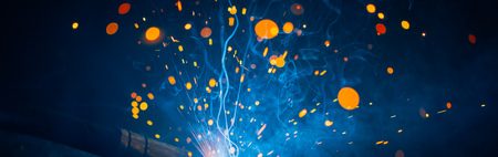 artistic welding sparks light, industrial backgroundの写真素材