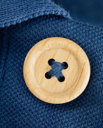button on a polo t-shirt fabric textureの写真素材