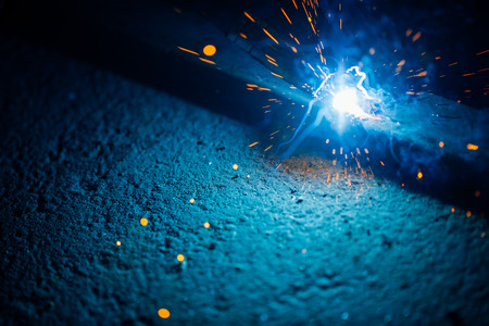 artistic welding sparks light, industrial backgroundの写真素材