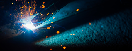 artistic welding sparks light, industrial backgroundの写真素材