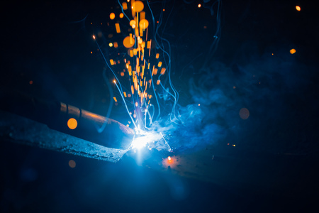 artistic welding sparks light, industrial backgroundの写真素材