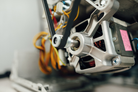 engine of washing machine with belt rollerの写真素材
