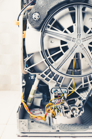 washing machine with open enclosure is ready for serviceの写真素材