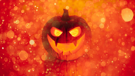 jack-o-lantern pumpkin orange particles, Halloween backgroundの写真素材