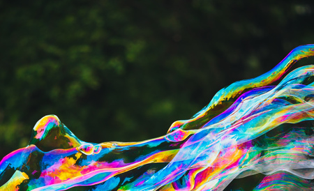 soap bubbles abstract shape, green backgroundの写真素材