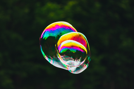 soap bubbles on green nature backgroundの写真素材