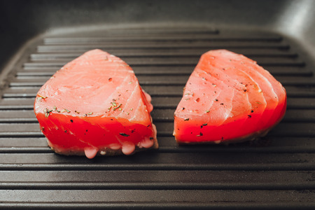 tuna fish grill cooking on frying pan
