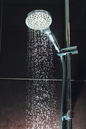 shower with flowing waterの写真素材