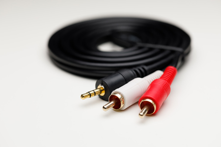 RCA mini jack audio cable, white background