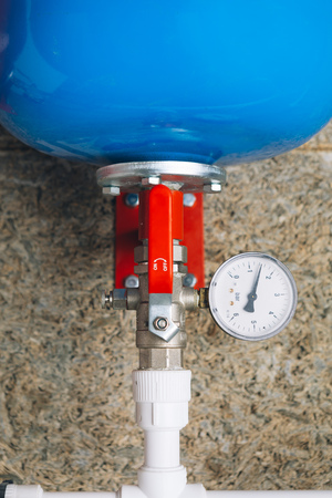 expansion tank with pressure gauge in boiler roomの写真素材