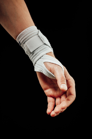 wrist and hand orthotics support for carpal tunnel syndrome healing, isolated on blackの写真素材