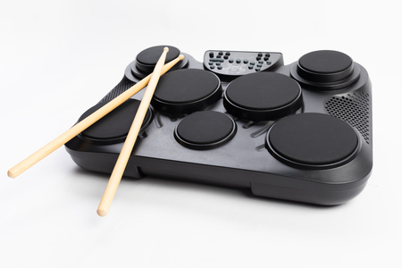 electronic drums portable music device, white backgroundの写真素材