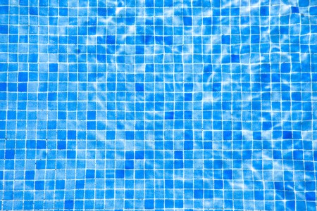 water and blue tile in swimming poolの写真素材