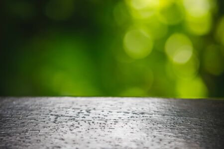 wooden basis and green nature bokeh background