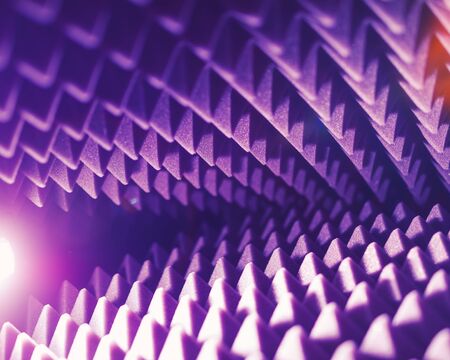 acoustic foam pyramid abstract background with glow lightの写真素材