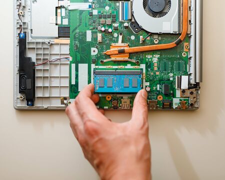 memory module ddr4 ram installation in laptop by hand