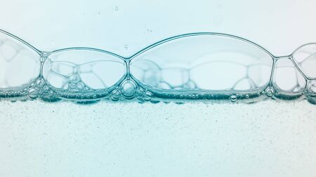 abstract liquid soap bubbles backgroundの写真素材