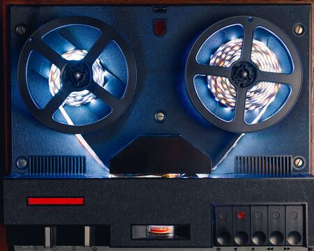 reel to reel audio tape recorder with blue led light stripの写真素材