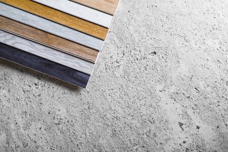 laminate flooring planks variations on concrete floor