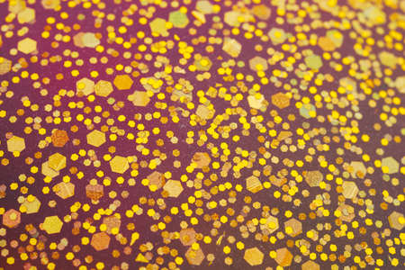 festive glitter background, golden foil particles