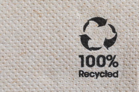 napkin paper with recycled sign, close-up texture with copy-spaceの写真素材
