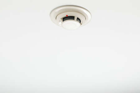 smoke detector of fire alarm, white backgroundの写真素材