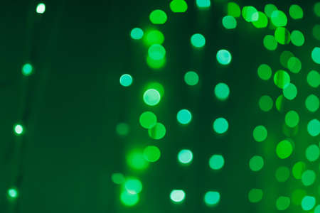 green led light bokeh backgroundの写真素材