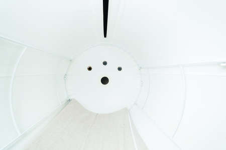hyperbaric pressure chamber for oxygen therapy, white background interiorの写真素材