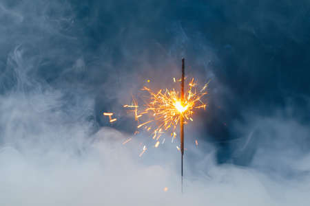 Fire sparkler in dense smoke
