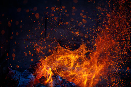 abstract fire in fireplace with sparksの写真素材