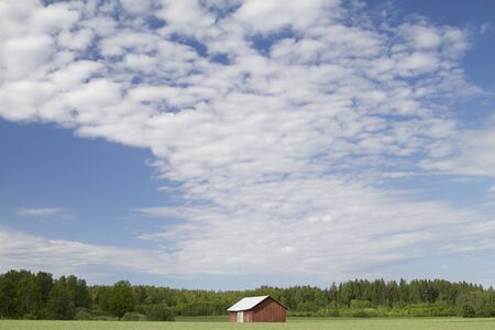 Barn in a fieldの写真素材