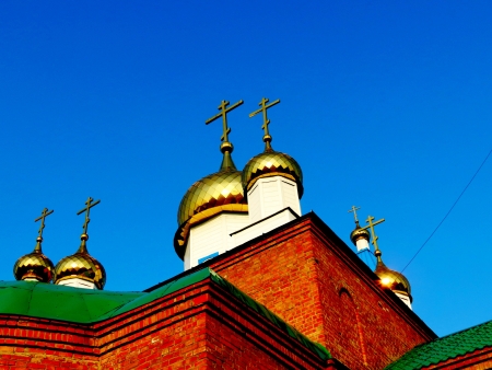 Domes of rural church are shone from sunshineの写真素材