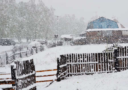 White snow has unexpectedly fallen out to land in medium of the Mayの写真素材