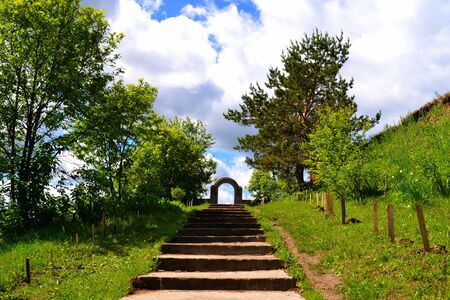 Rustic church in winter and summer decorates rural landscapeの写真素材