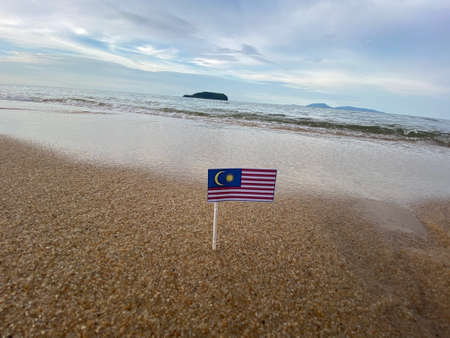 MYGIG123RF - Malaysia flag on the sandy beach. Malaysia Day! My proud My love!の写真素材