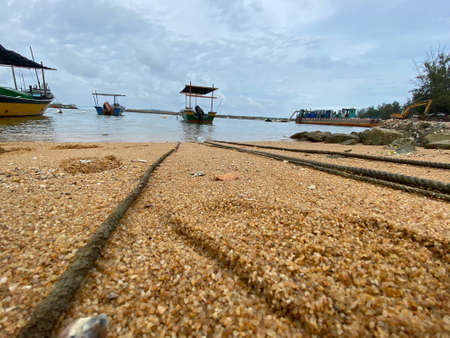 Scenery view near the jetty to Kapas island. Fishing boat.の写真素材