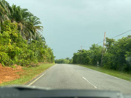 After the rain, On the road to the  rural village area in Marang.の写真素材